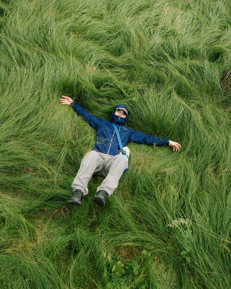 Lying in the grass on a trip