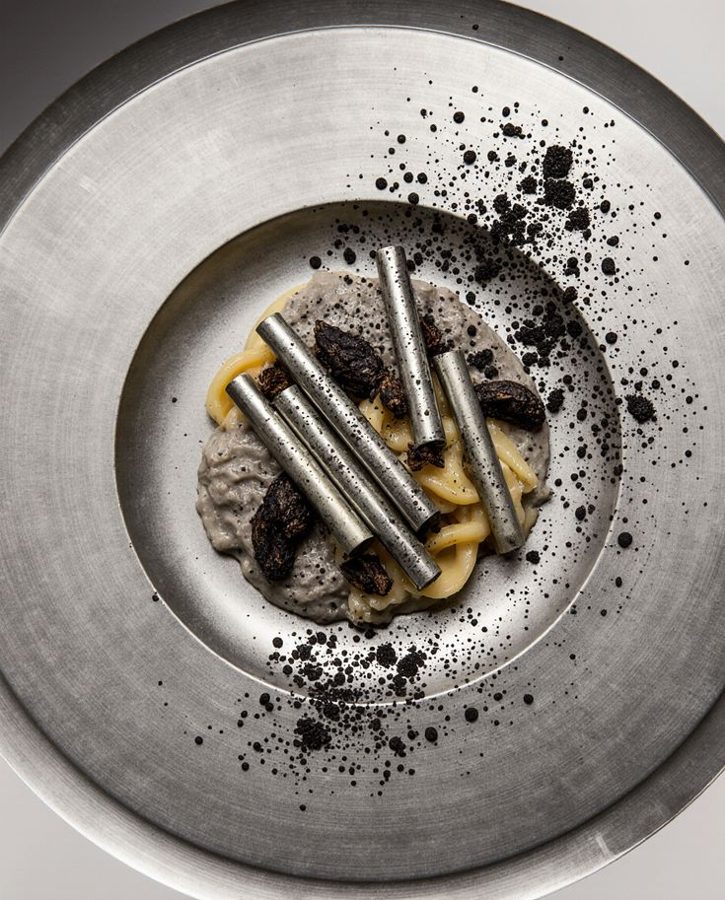 Pasta plated on pewter with ash